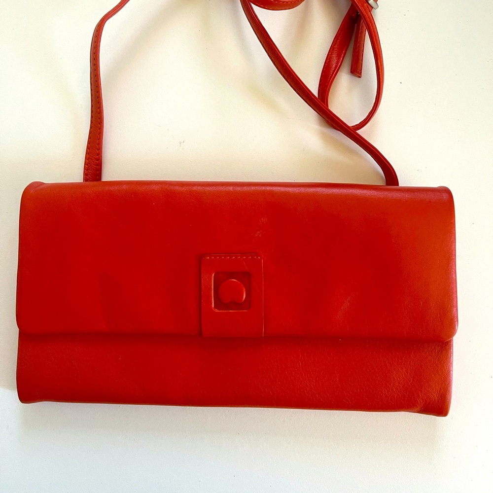 Orange Delsey travel wallet